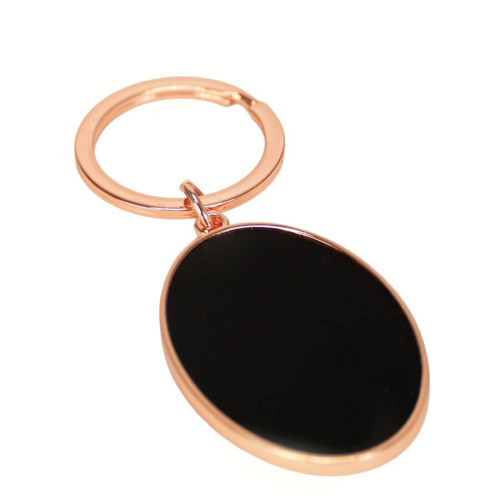 LLAVERO DISEÑO OVALADO ENCOBRIZADO